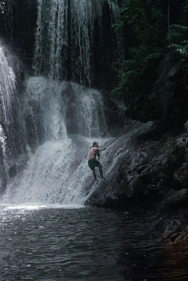 Person at waterfall